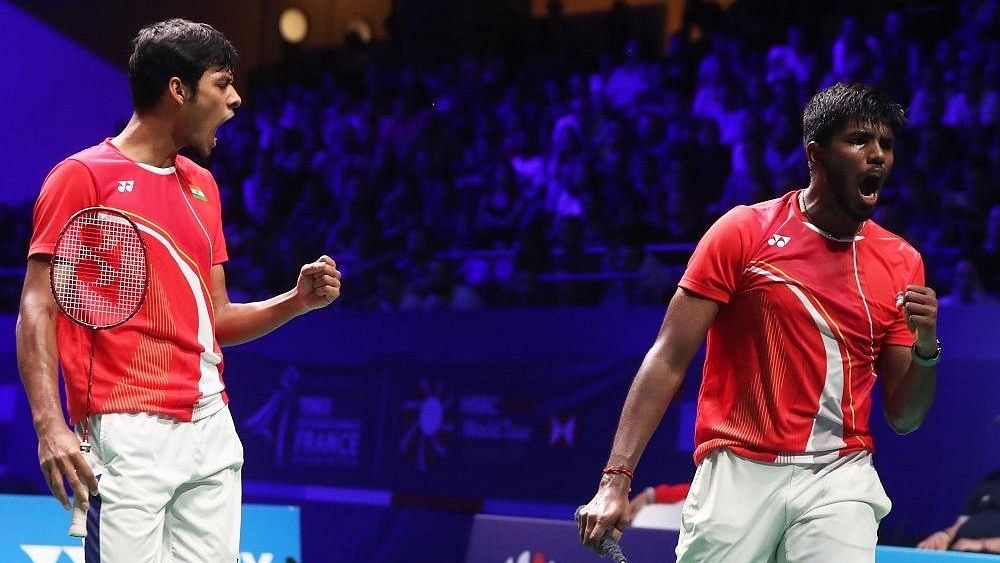 <div class="paragraphs"><p>Satwiksairaj Rankireddy and Chirag Shetty celebrate after winning the Thailand Open.</p></div>