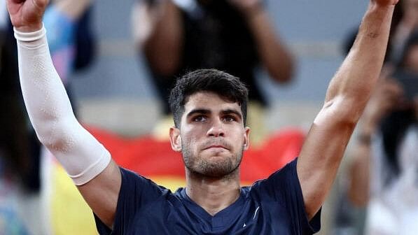 <div class="paragraphs"><p>Spain's Carlos Alcaraz reacts after winning his first round match against JJ Wolf of the United States.</p></div>