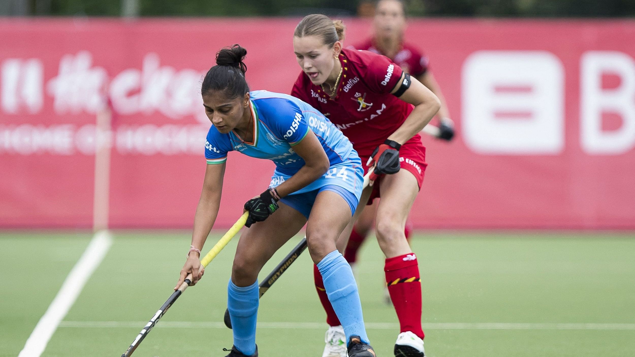 <div class="paragraphs"><p>India's Jyoti Rumawat (L) fights for the ball with Belgium's Delphine Marien during the Women's field hockey group stage match of the 2024 Women's FIH Pro League,</p></div>