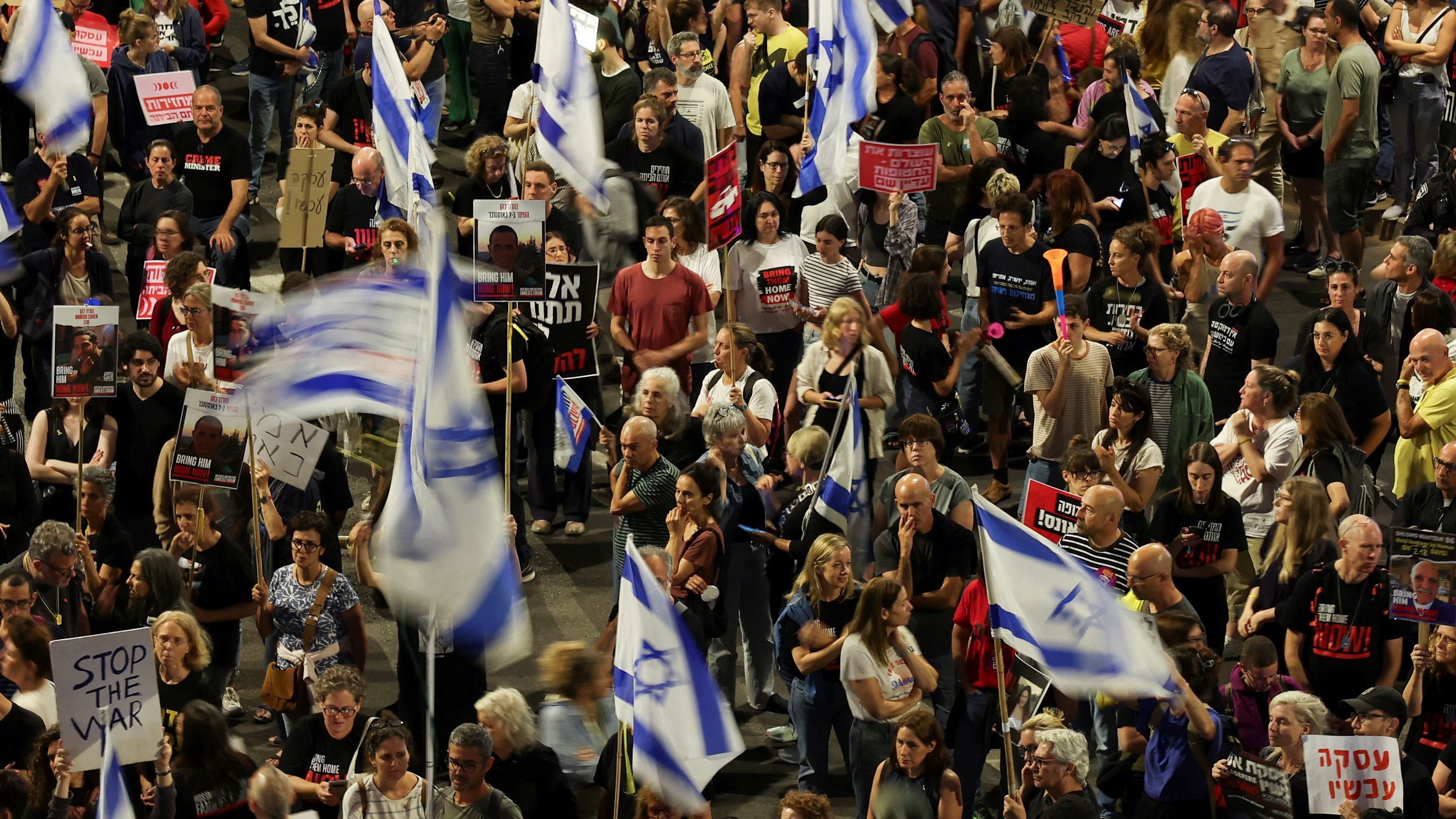 <div class="paragraphs"><p>Protest against Israeli Prime Minister Benjamin Netanyahu's government, in Tel Aviv</p></div>