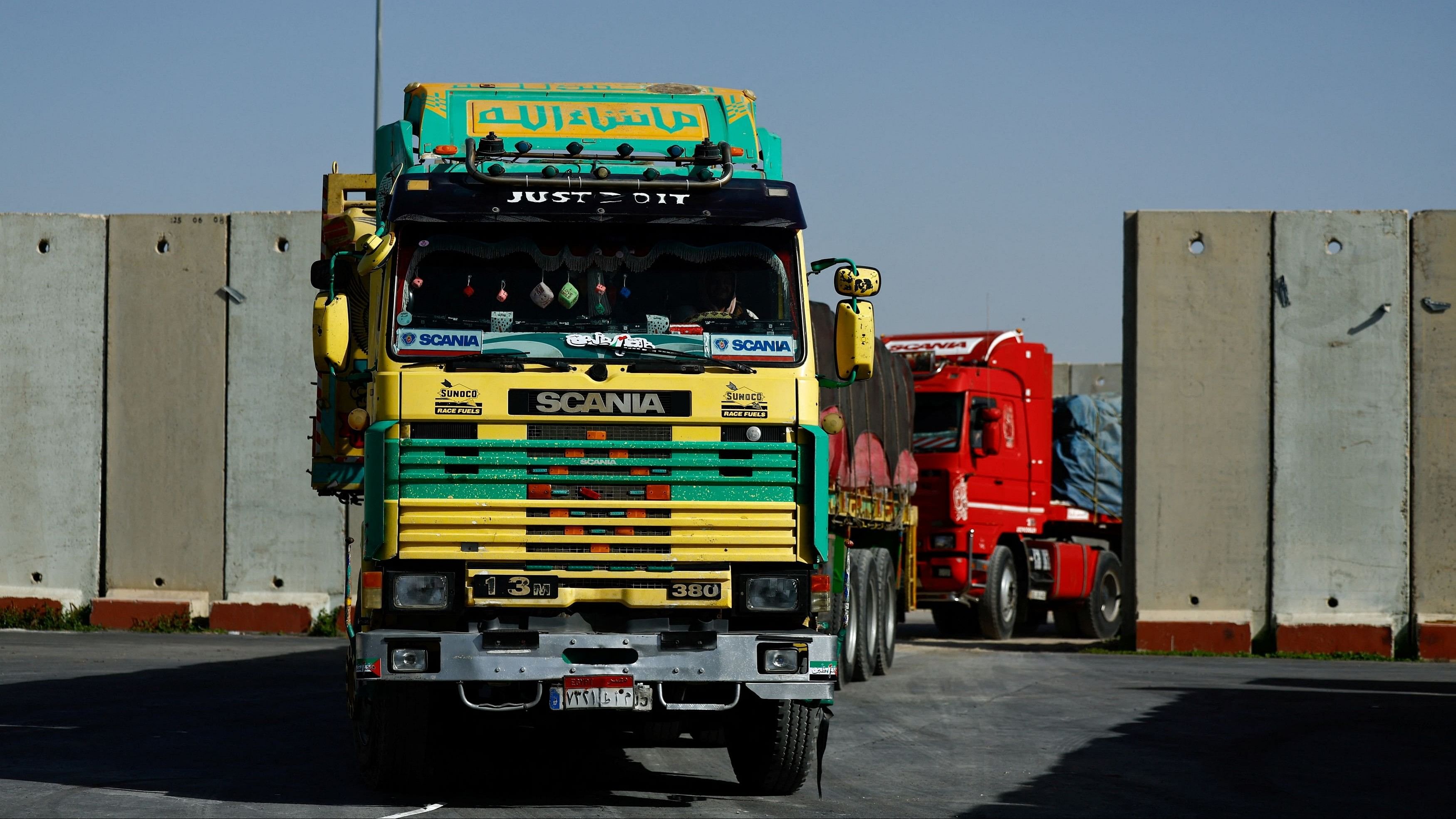 <div class="paragraphs"><p>This 2023 file photo shows aid trucks from Egypt enter into the cargo inspection area, before going to Gaza from the Kerem Shalom crossing. Representative image.</p></div>