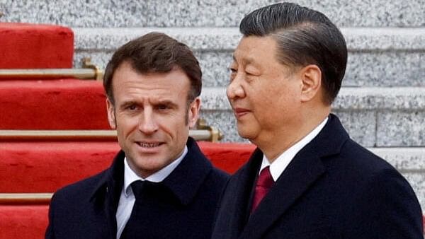 <div class="paragraphs"><p>Chinese President Xi Jinping seen here with French President Emmanuel Macron.</p></div>