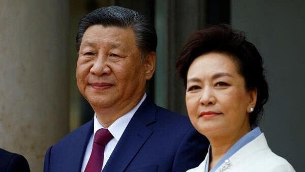 <div class="paragraphs"><p>China's President Xi Jinping and his wife Peng Liyuan arrive at the Elysee Palace in Paris as part of their two-day state visit in France, May 6, 2024. </p></div>