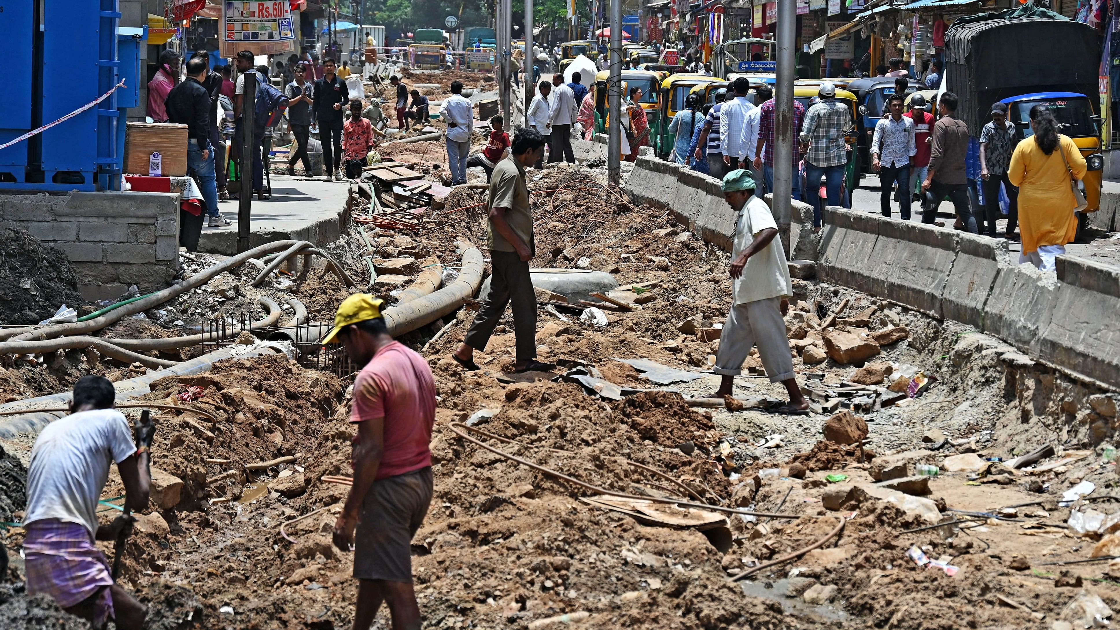 <div class="paragraphs"><p>White-topping and road infrastructure-related works at Chickpet’s bustling BVK Iyengar Road on Thursday. </p></div>