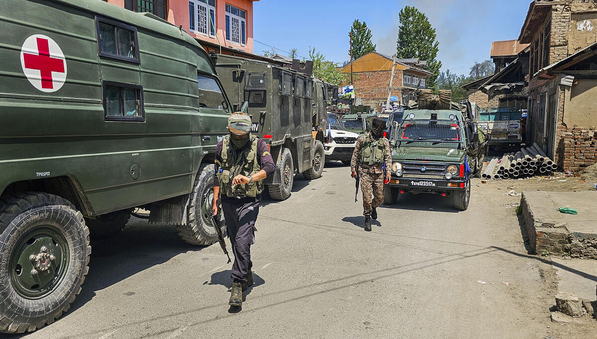 <div class="paragraphs"><p>Security forces personnel during an encounter with militants at Redwani Payeen area of Kulgam.</p></div>