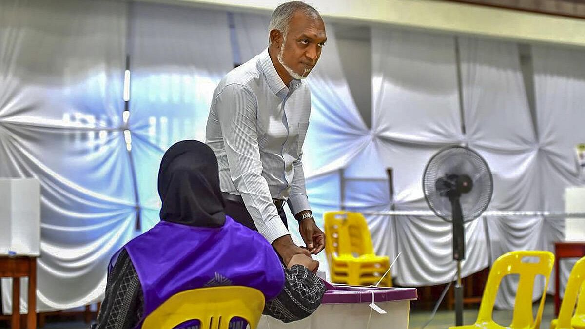 <div class="paragraphs"><p> Maldives President Mohamed Muizzu arrives to cast his ballot for parliamentary election at a polling station in Mali, Maldives</p></div>