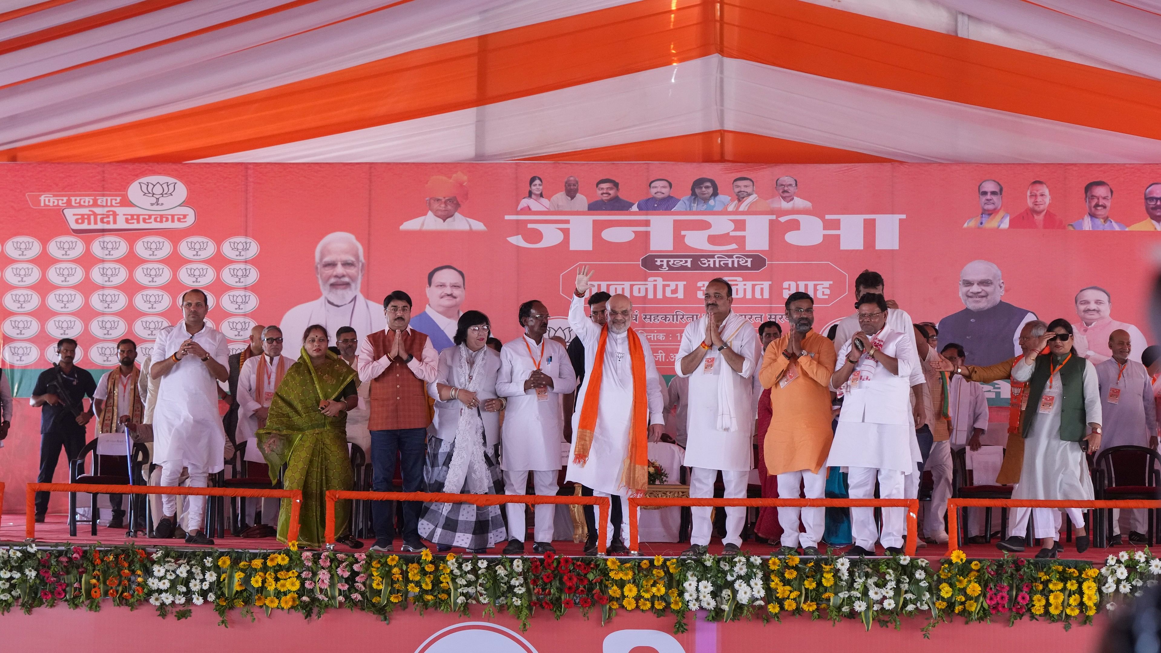 <div class="paragraphs"><p>Union Home Minister Amit Shah with BJP candidate Dinesh Pratap Singh during a public meeting for Lok Sabha elections, in Raebareli, Sunday.</p></div>