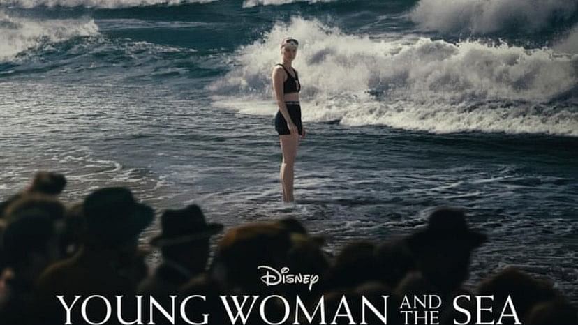 <div class="paragraphs"><p>Poster of the film 'Young Woman and the Sea' featuring Daisy Ridley.</p></div>