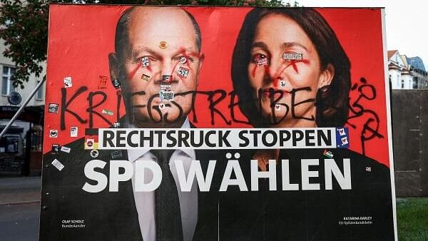 <div class="paragraphs"><p>An election campaign poster showing German Chancellor Olaf Scholz and Katarina Barley, top candidate of Germany's Social Democratic Party (SPD) for the upcoming EU election, is covered with graffiti in Berlin, Germany, May 1, 2024. The slogan reads "Stop the shift to the right - vote SPD"</p></div>