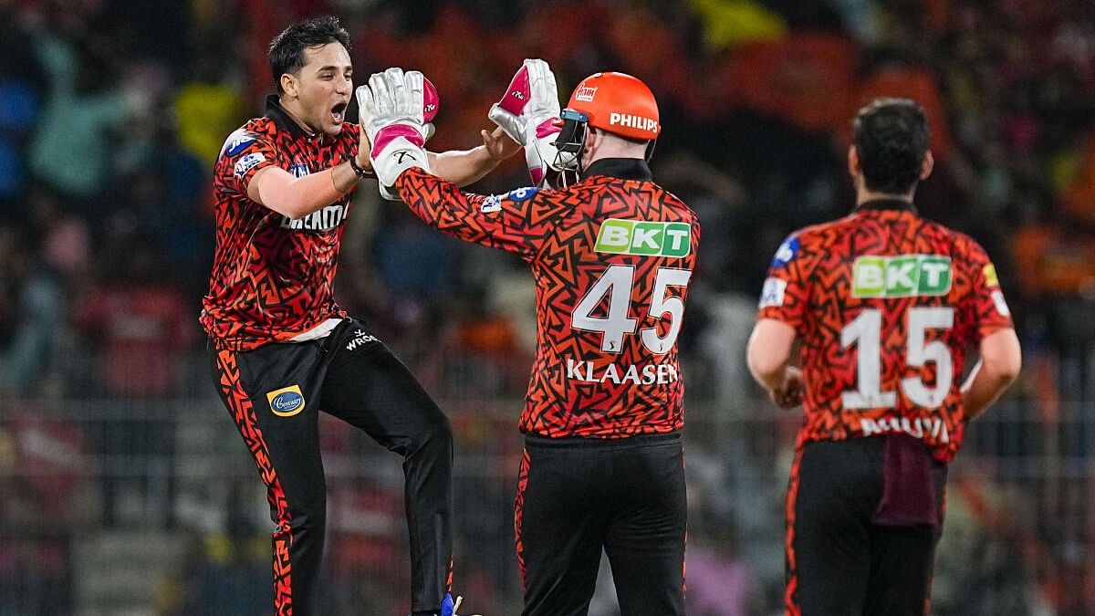 <div class="paragraphs"><p>Sunrisers Hyderabad bowler Abhishek Sharma celebrates with teammates after taking the wicket of Rajasthan Royals batter Shimron Hetmyer during the Indian Premier League (IPL) Qualifier 2 cricket match between Rajasthan Royals and Sunrisers Hyderabad, at MA Chidambaram Stadium, in Chennai, Friday, May 24, 2024.</p></div>