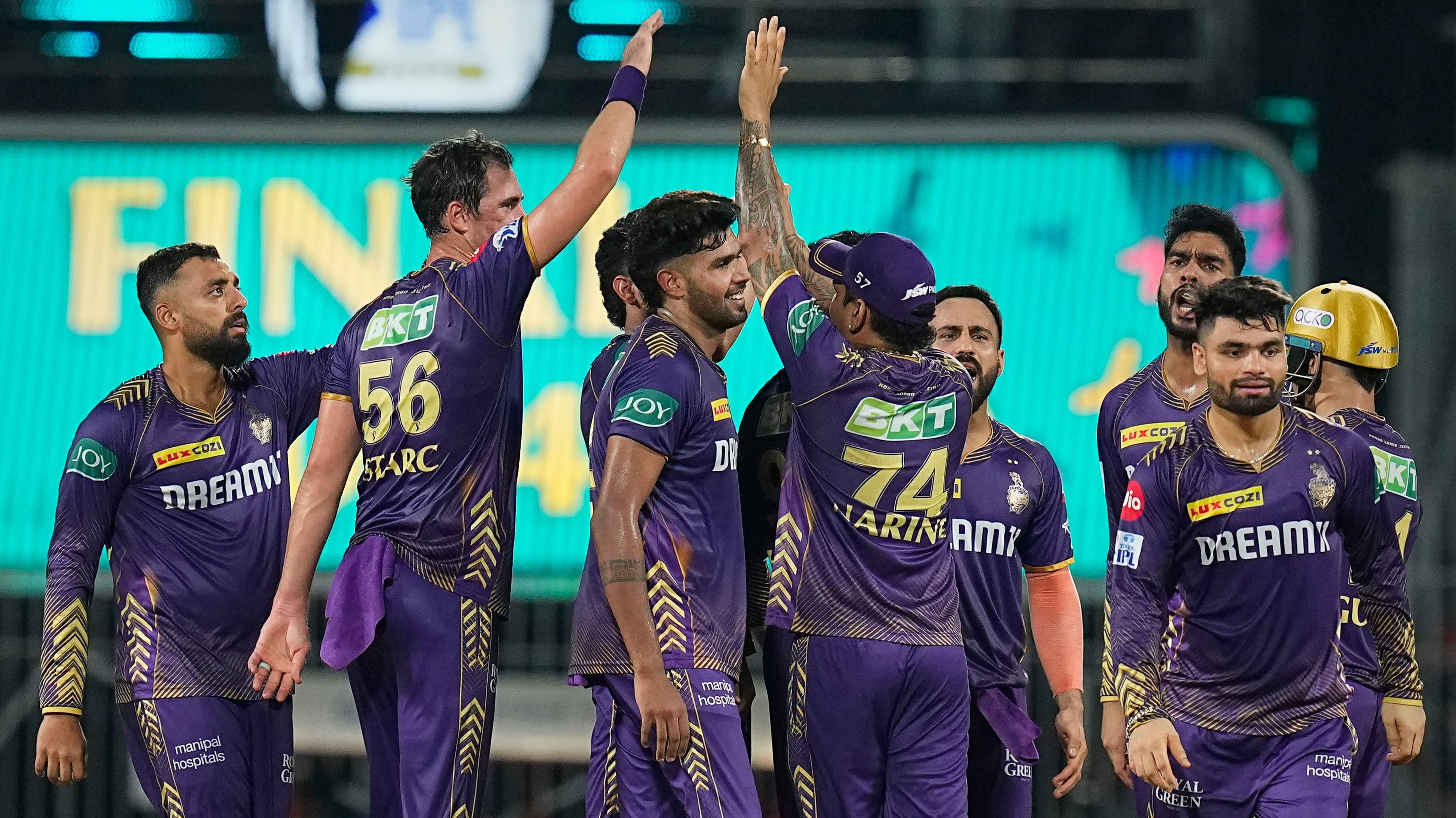 <div class="paragraphs"><p>Kolkata Knight Riders' Varun Chakravarthy with teammates celebrates the wicket of Sunrisers Hyderabad batter Shahbaz Ahmed during IPL final.</p></div>