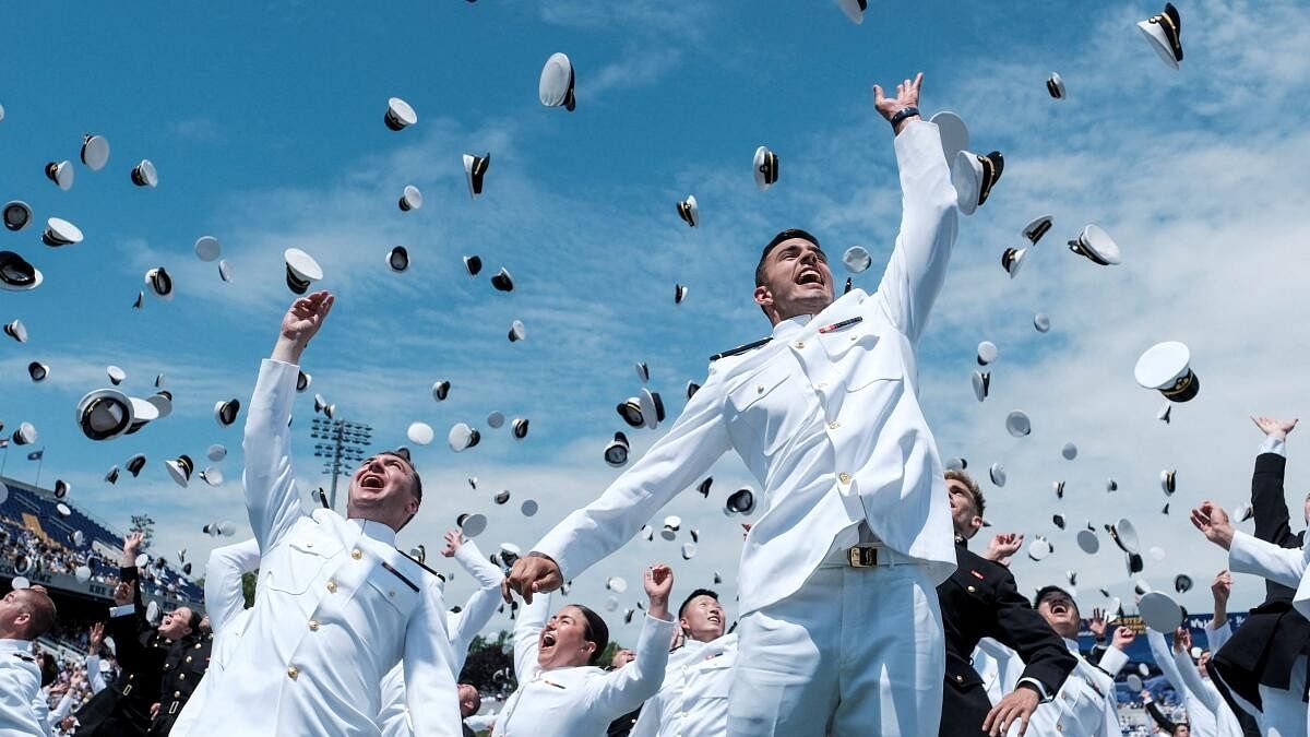 <div class="paragraphs"><p>Midshipmen toss their caps into the air as they celebrate during the commissioning and graduation ceremony at the U.S. Naval Academy in Annapolis, Maryland, U.S., May 24, 2024.</p></div>