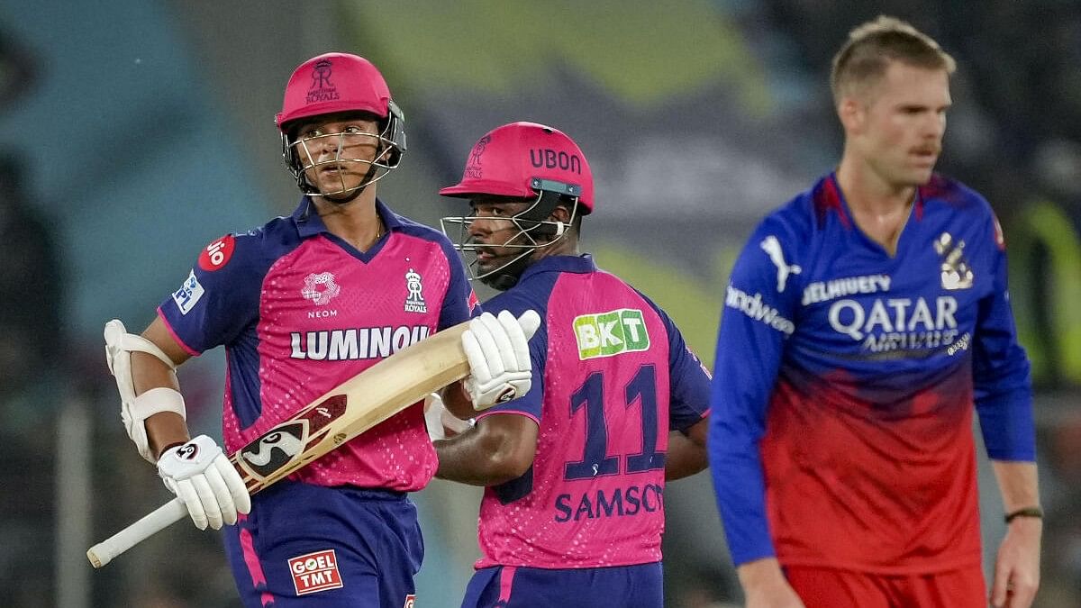 <div class="paragraphs"><p>Rajasthan Royals' Yashasvi Jaiswal and Sanju Samson run between the wickets during the Indian Premier League (IPL) 2024 T20 cricket match between Royal Challengers Bangaluru and Rajasthan Royals at the Narendra Modi Stadium, in Ahmedabad, Wednesday, May 22, 2024.</p></div>