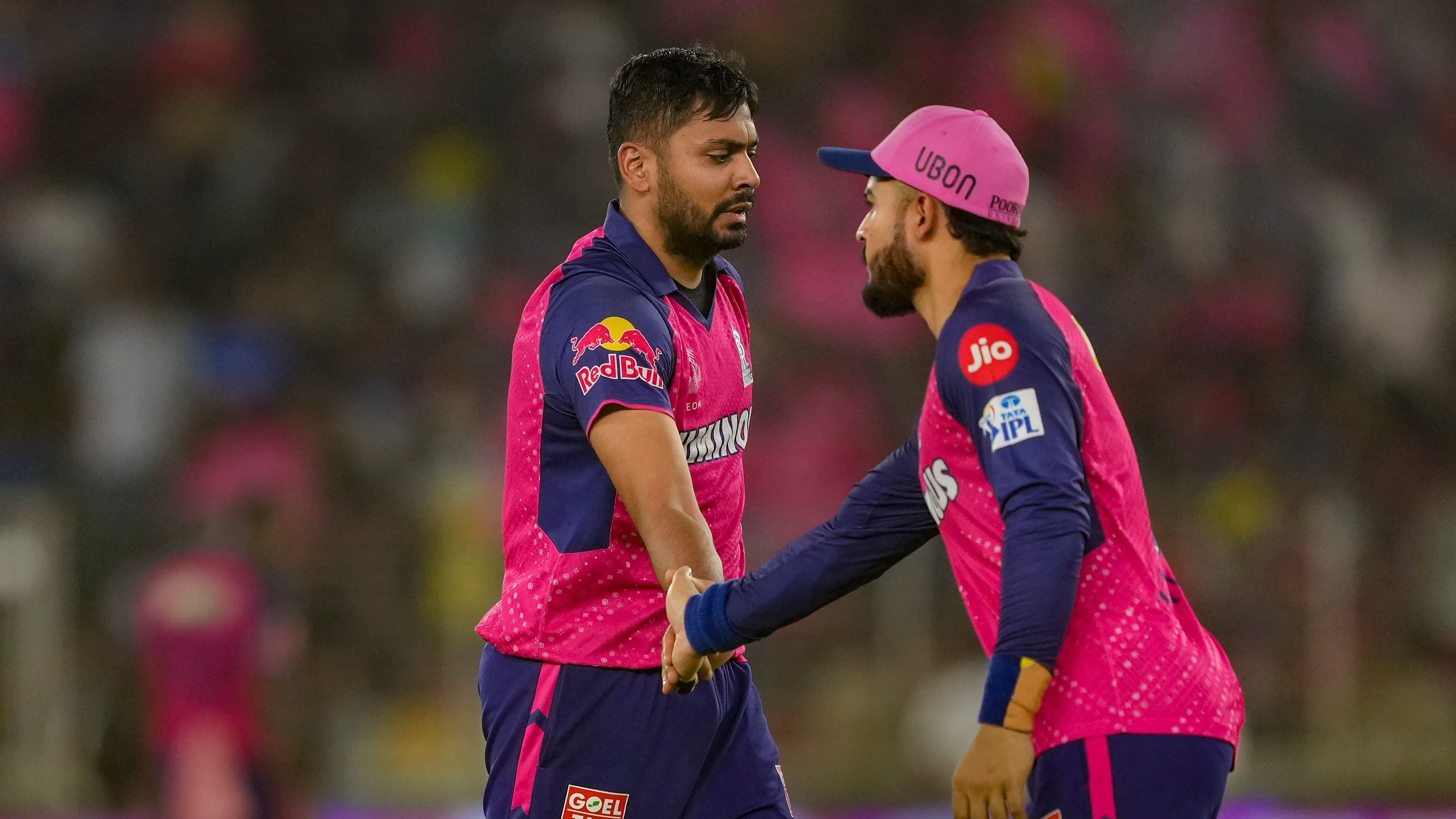 <div class="paragraphs"><p>Rajasthan Royals' Avesh Khan (left) celebrates the wicket of Royal Challengers Bengaluru's Mahipal Lomror (not in pic) during their IPL eliminator match in Ahmedabad on Wednesday. </p></div>