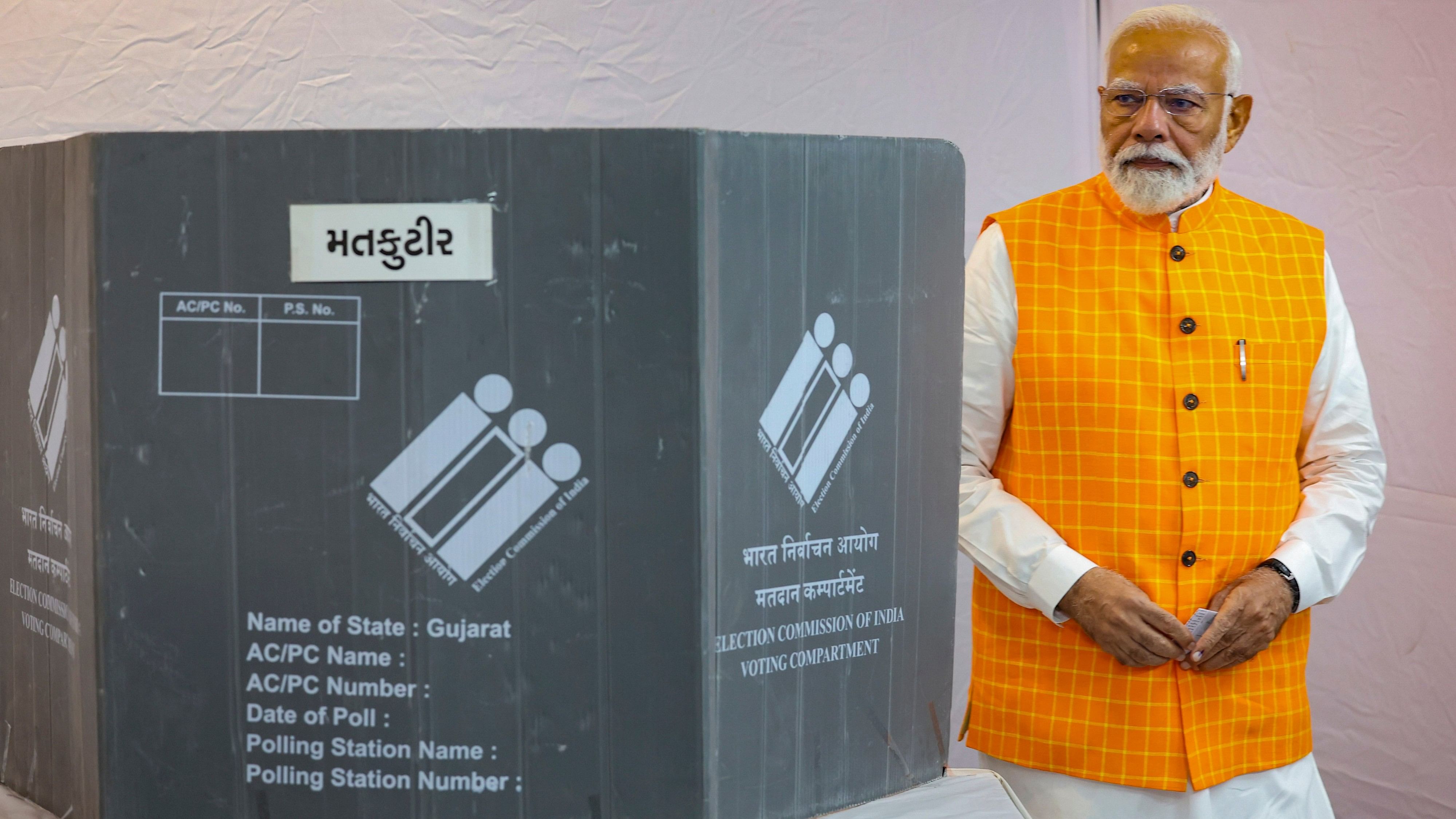 <div class="paragraphs"><p>Prime Minister Narendra Modi casts his vote at a polling station during the third phase of Lok Sabha elections, in Ahmedabad, Tuesday, May 7, 2024. </p></div>