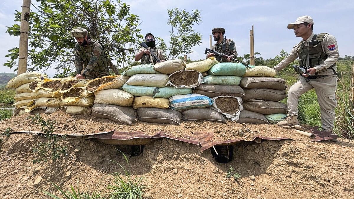 <div class="paragraphs"><p> Manipur Police and Army personnel during a search and area domination operation in vulnerable areas of hill and valley districts of Manipur.</p></div>