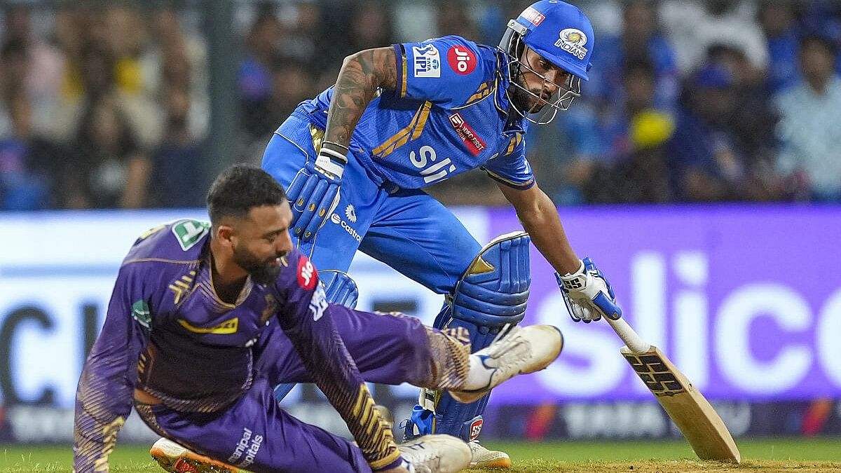 <div class="paragraphs"><p>Kolkata Knight Riders player Varun Chakaravarthy and Mumbai Indians' Tilak Varma during the IPL match between Kolkata Knight Riders and Mumbai Indians</p></div>