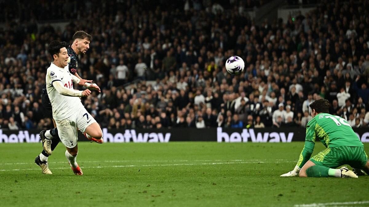 <div class="paragraphs"><p>Manchester City's Stefan Ortega saves a shot by Tottenham Hotspur's Son Heung-min.</p></div>