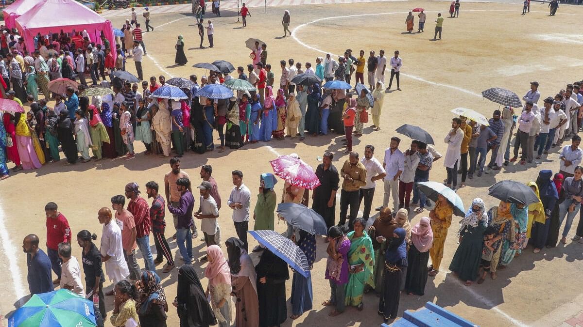 <div class="paragraphs"><p>People wait to cast their votes for the sixth phase of Lok Sabha elections, in Ranchi.</p></div>