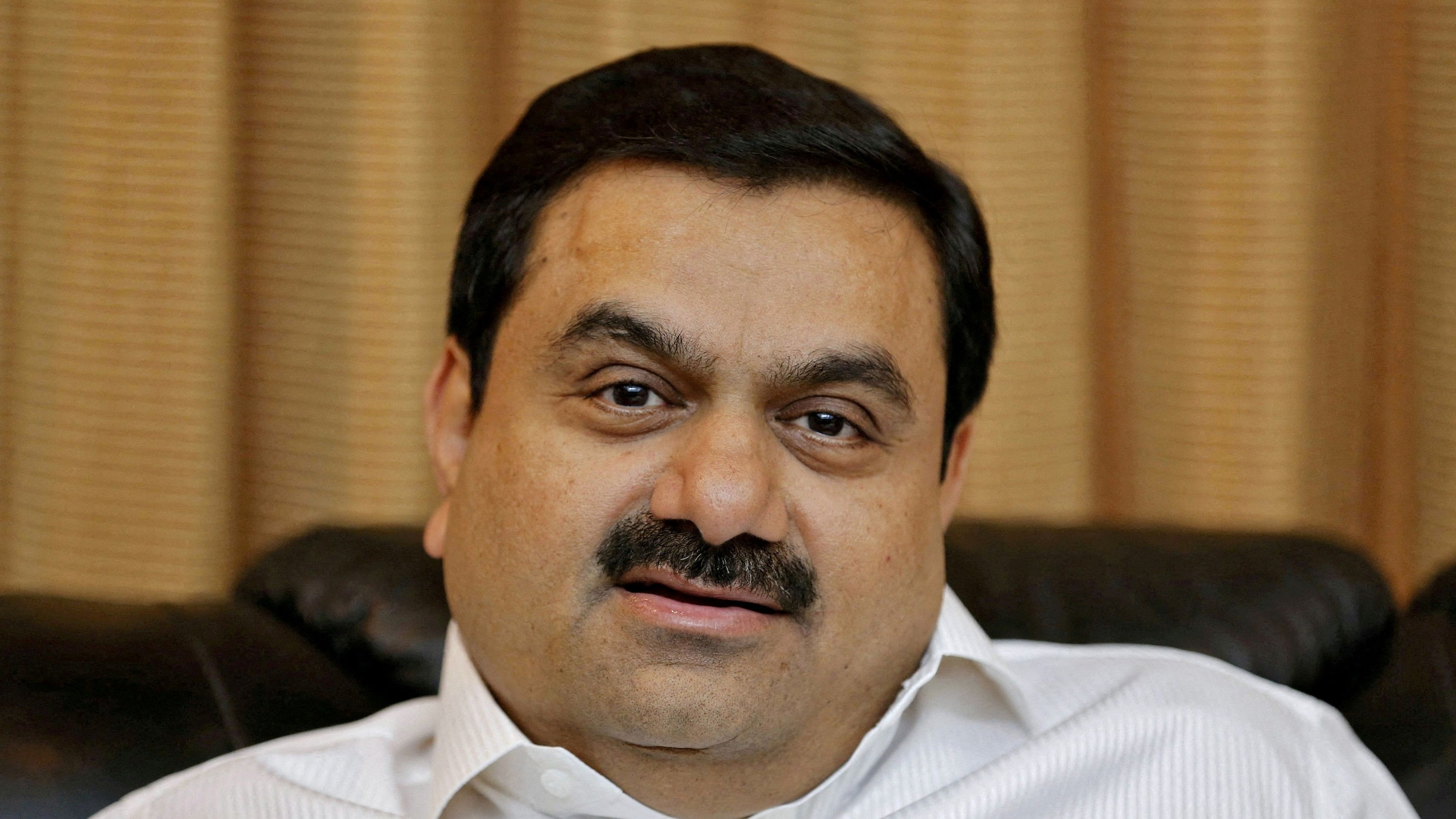 <div class="paragraphs"><p>A college dropout, Adani began his career in the diamond industry before joining a plastics factory run by his brother.</p></div>