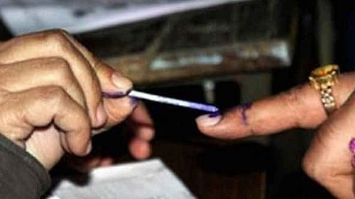 <div class="paragraphs"><p>Representative image showing indelible ink being applied to a voter's finger.</p></div>