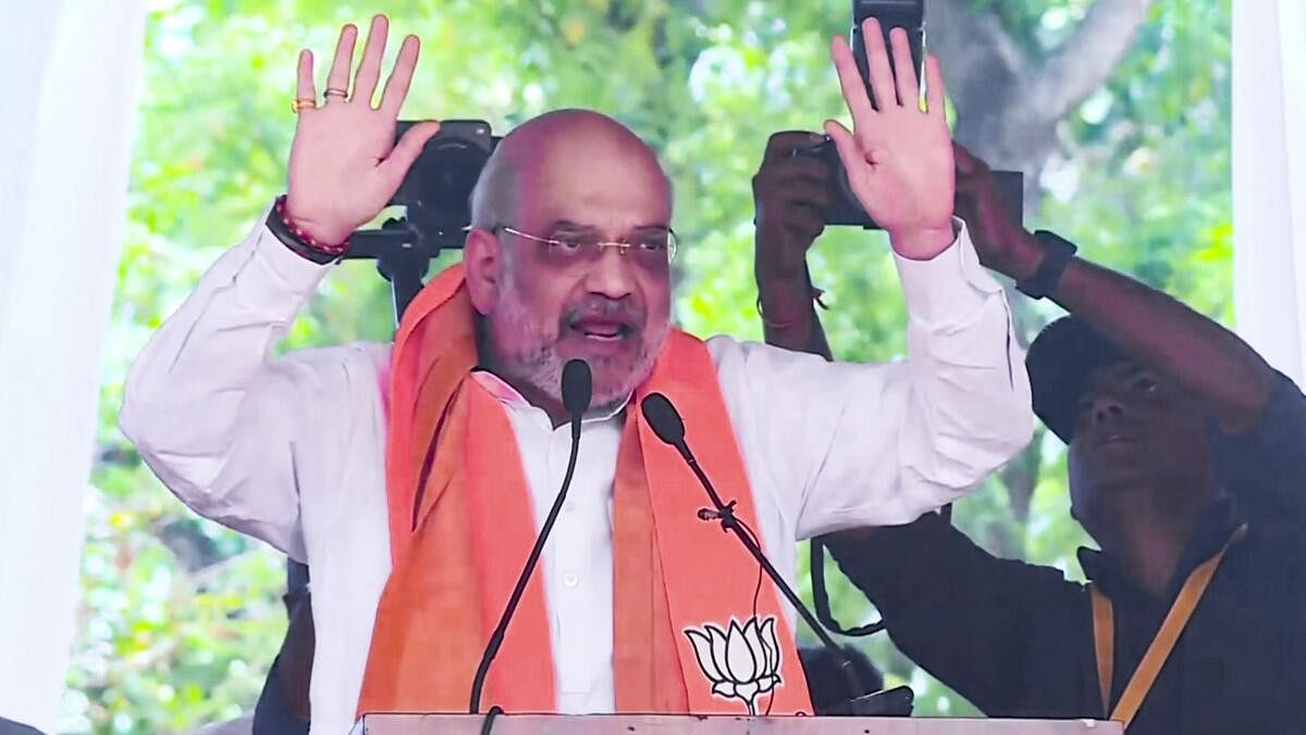 <div class="paragraphs"><p>Union Home Minister Amit Shah addresses a public meeting ahead of the third phase of Lok Sabha elections, in Belagavi district, Friday, May 3, 2024.</p></div>