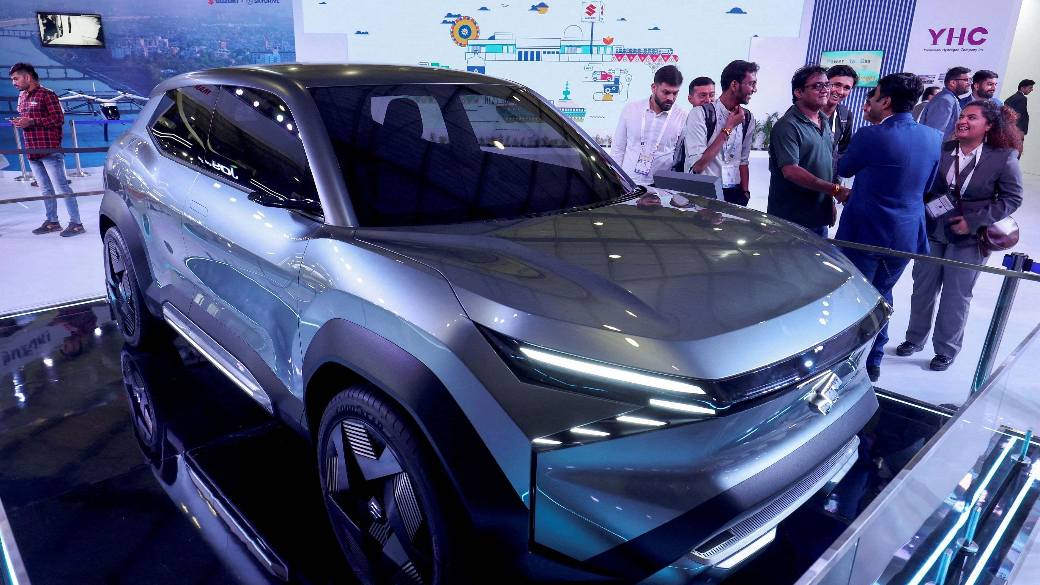 <div class="paragraphs"><p>Visitors look at a Maruti Suzuki eVX concept electric SUV in a Maruti Suzuki stall.</p></div>