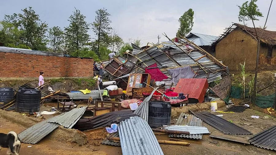 <div class="paragraphs"><p>Houses damaged after a hailstorm, in Imphal valley.</p></div>