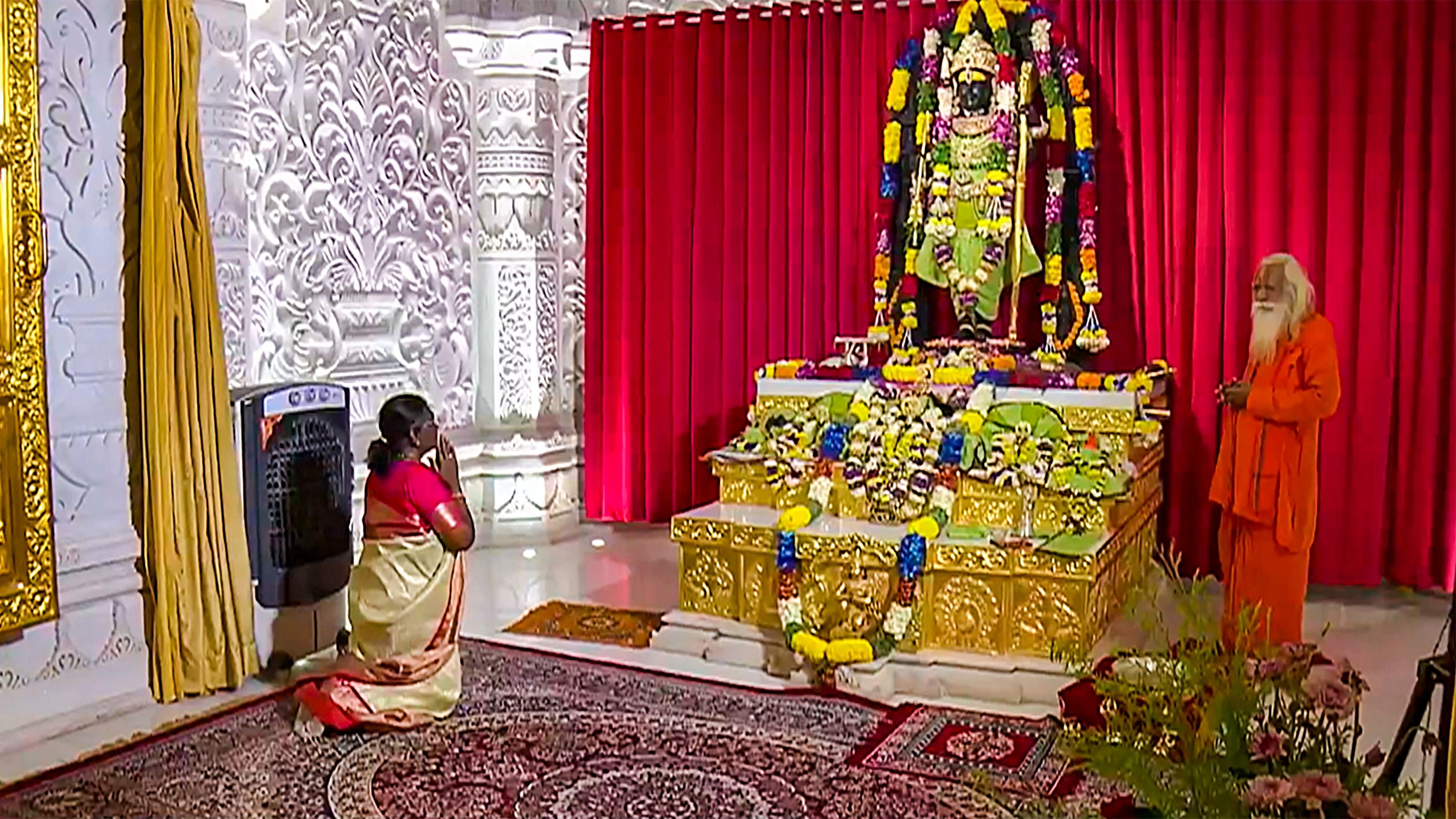 <div class="paragraphs"><p>President Droupadi Murmu offers prayers at the Ram Temple, in Ayodhya, on Wednesday.</p></div>