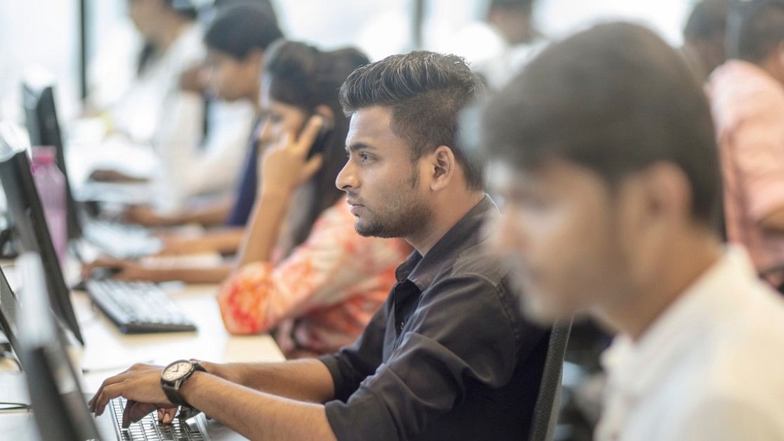 <div class="paragraphs"><p>Representative image showing people working in a office.</p></div>