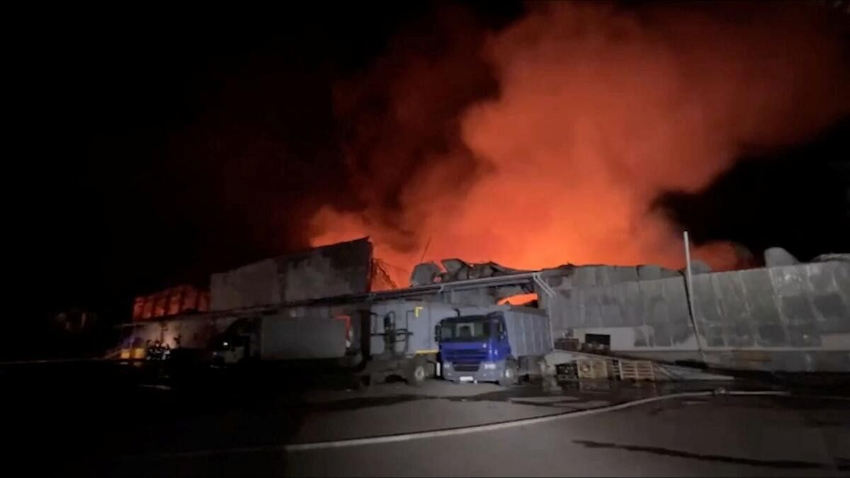 <div class="paragraphs"><p>Smoke rises following a Russian ballistic missile that struck a postal depot at a location given as Odesa, Ukraine.</p></div>