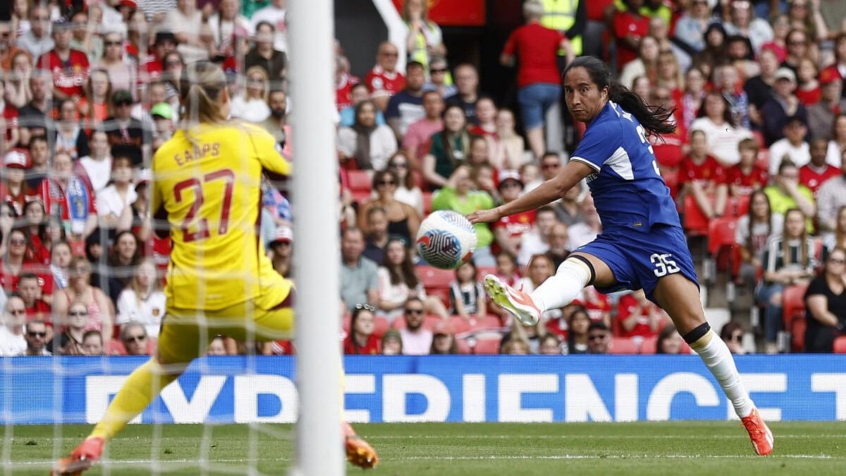 <div class="paragraphs"><p>Chelsea's Mayra Ramirez scores their fourth goal against Manchester United.</p></div>