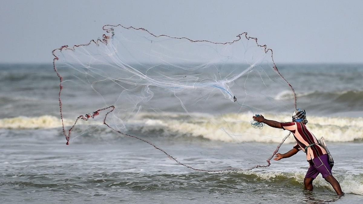 <div class="paragraphs"><p>Representative image showing a fisherman throwing a net for fishing.</p></div>
