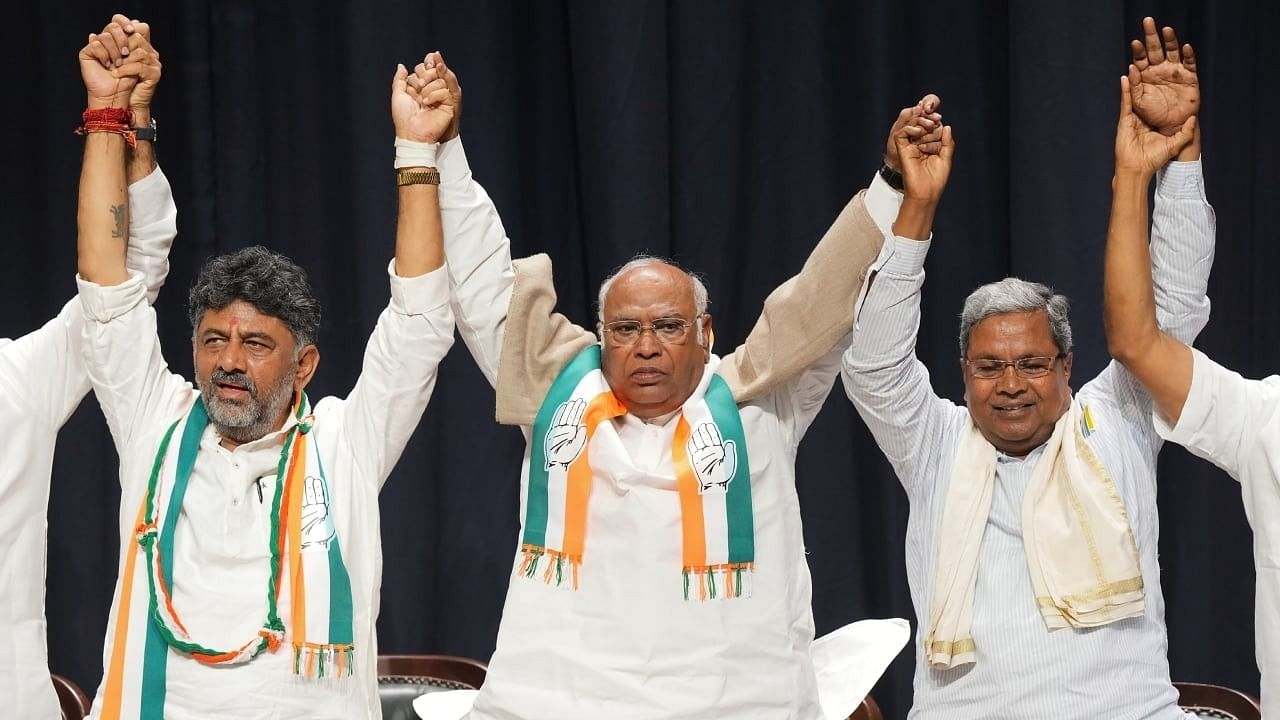 <div class="paragraphs"><p>Congress President Mallikarjun Kharge with Karnataka CM Siddaramaiah and Deputy CM D K Shivakumar</p></div>