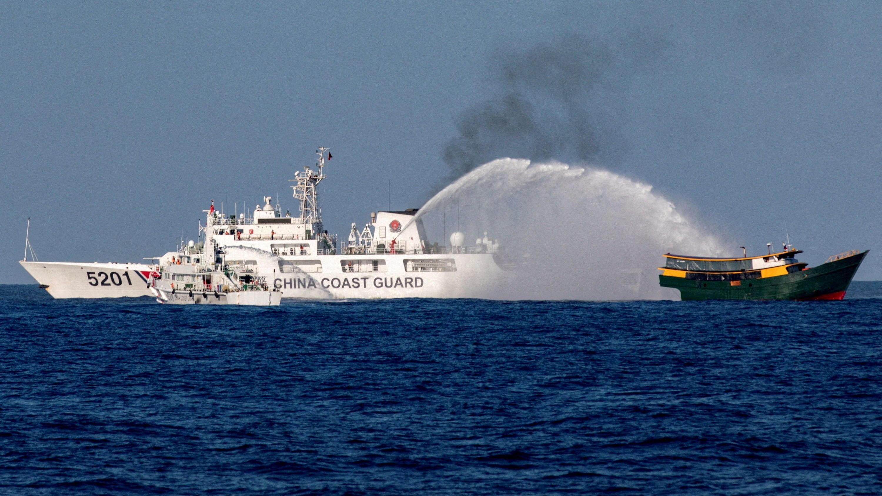 <div class="paragraphs"><p>File photo showing Chinese Coast Guard vessels firing water cannons towards a Philippine resupply vessel Unaizah as it made its way to the Second Thomas Shoal in the South China Sea.</p></div>