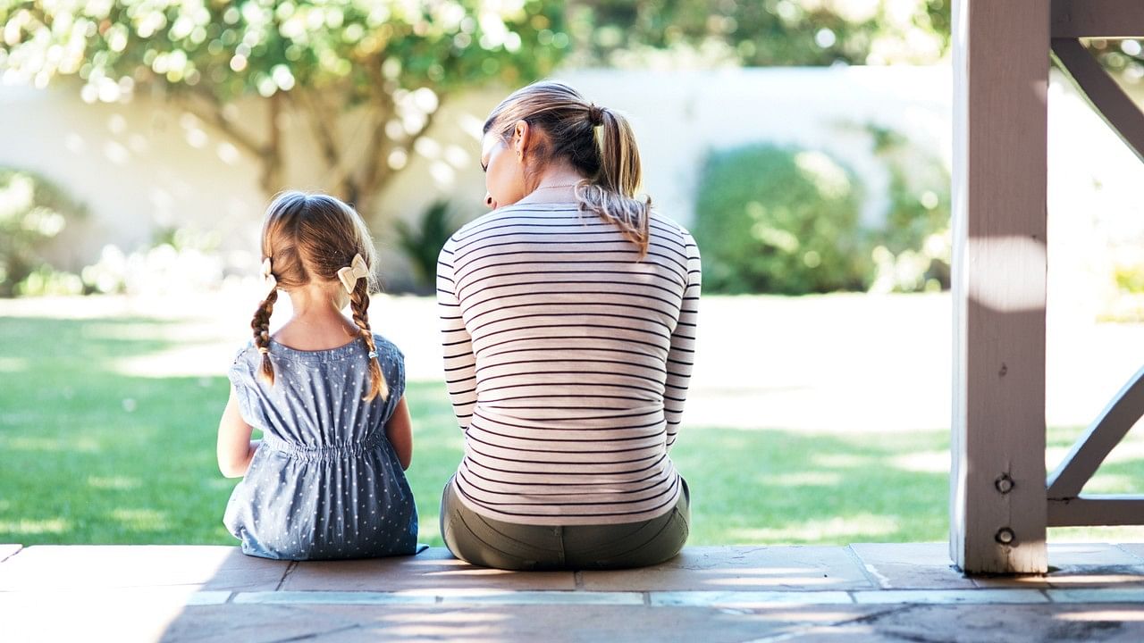 <div class="paragraphs"><p>Representative image of a young woman and her daughter having a conversation on the porch.&nbsp;</p></div>