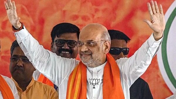 <div class="paragraphs"><p>Union Home Minister Amit Shah during a public meeting for Lok Sabha elections, in North 24 Parganas, Tuesday, May 14, 2024.</p></div>