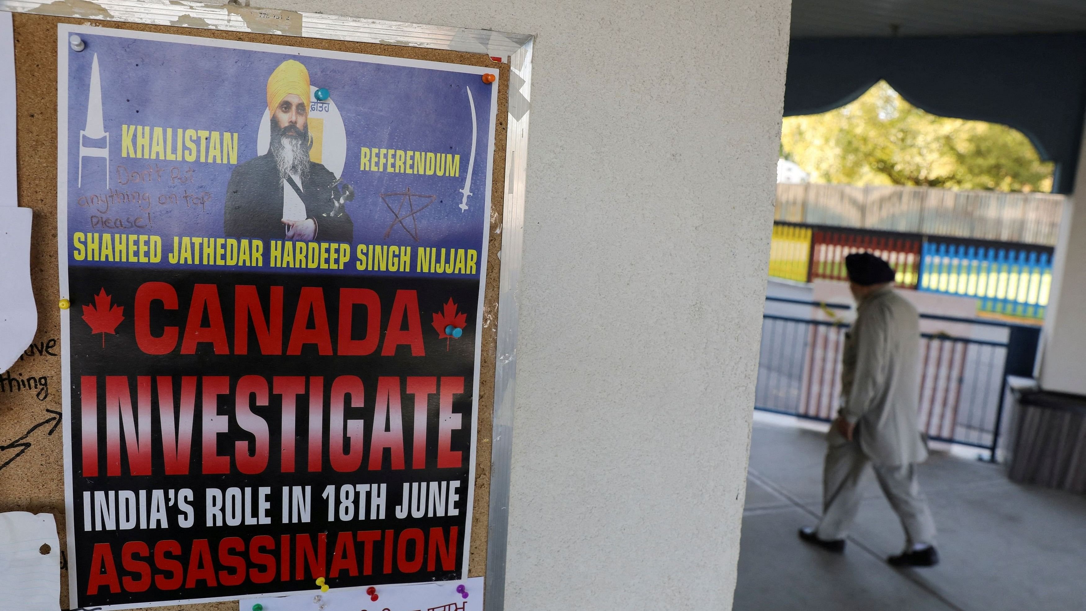 <div class="paragraphs"><p>A sign asking for an investigation into India's alleged role in the killing of Sikh leader Hardeep Singh Nijjar is seen at the Guru Nanak Sikh Gurdwara temple, in Surrey, British Columbia, Canada.</p></div>