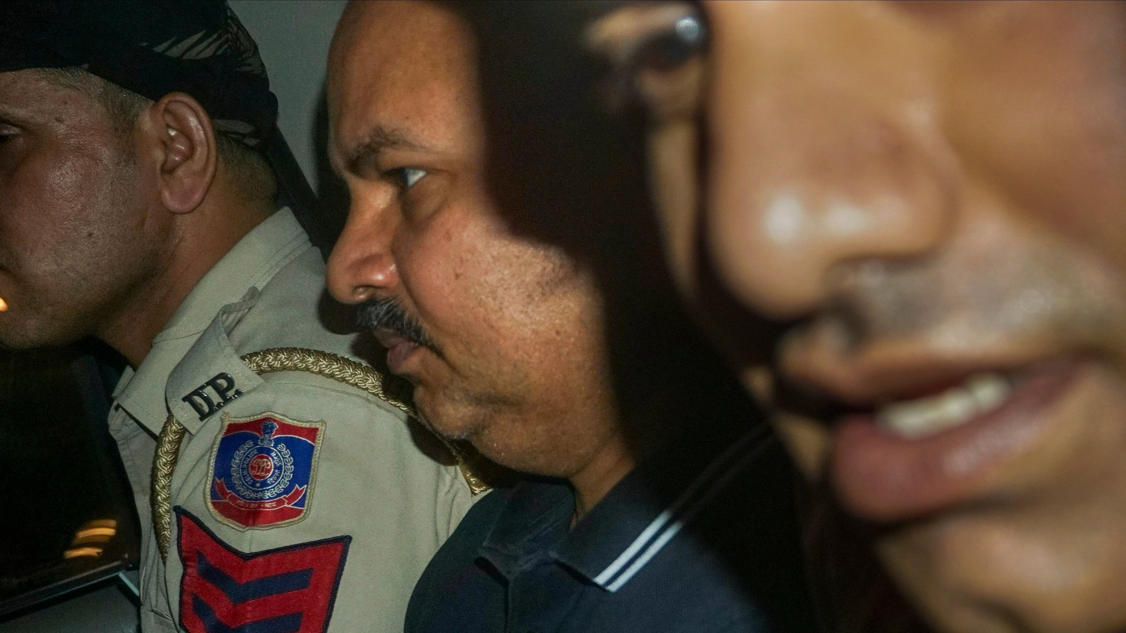 <div class="paragraphs"><p>Delhi CM Arvind Kejriwal's aide Bibhav Kumar being taken to custody by Delhi Police after his medical test in the case of alleged assault on AAP MP Swati Maliwal, in New Delhi, Saturday, May 18, 2024. </p></div>