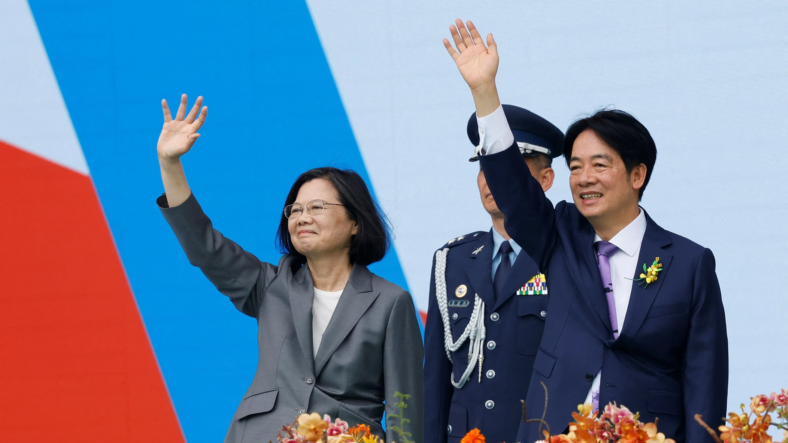 <div class="paragraphs"><p>Taiwan's former President Tsai Ing-wen and new President Lai Ching-te wave to people during the inauguration ceremony outside the Presidential office building in Taipei, Taiwan May 20, 2024. </p></div>