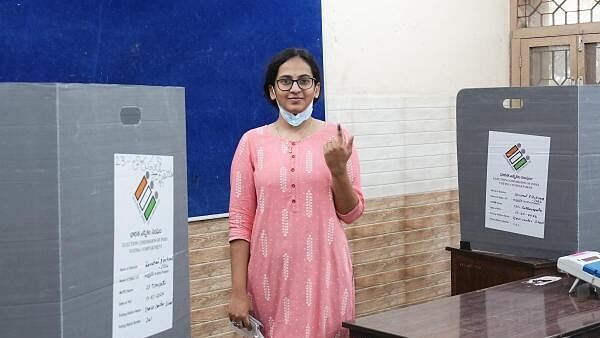 <div class="paragraphs"><p>A woman shows her finger marked with indelible ink after casting her vote at a polling station during the fourth phase of Lok Sabha elections and Andhra Pradesh Assembly elections, at Sullurupeta in Tirupati district.</p></div>