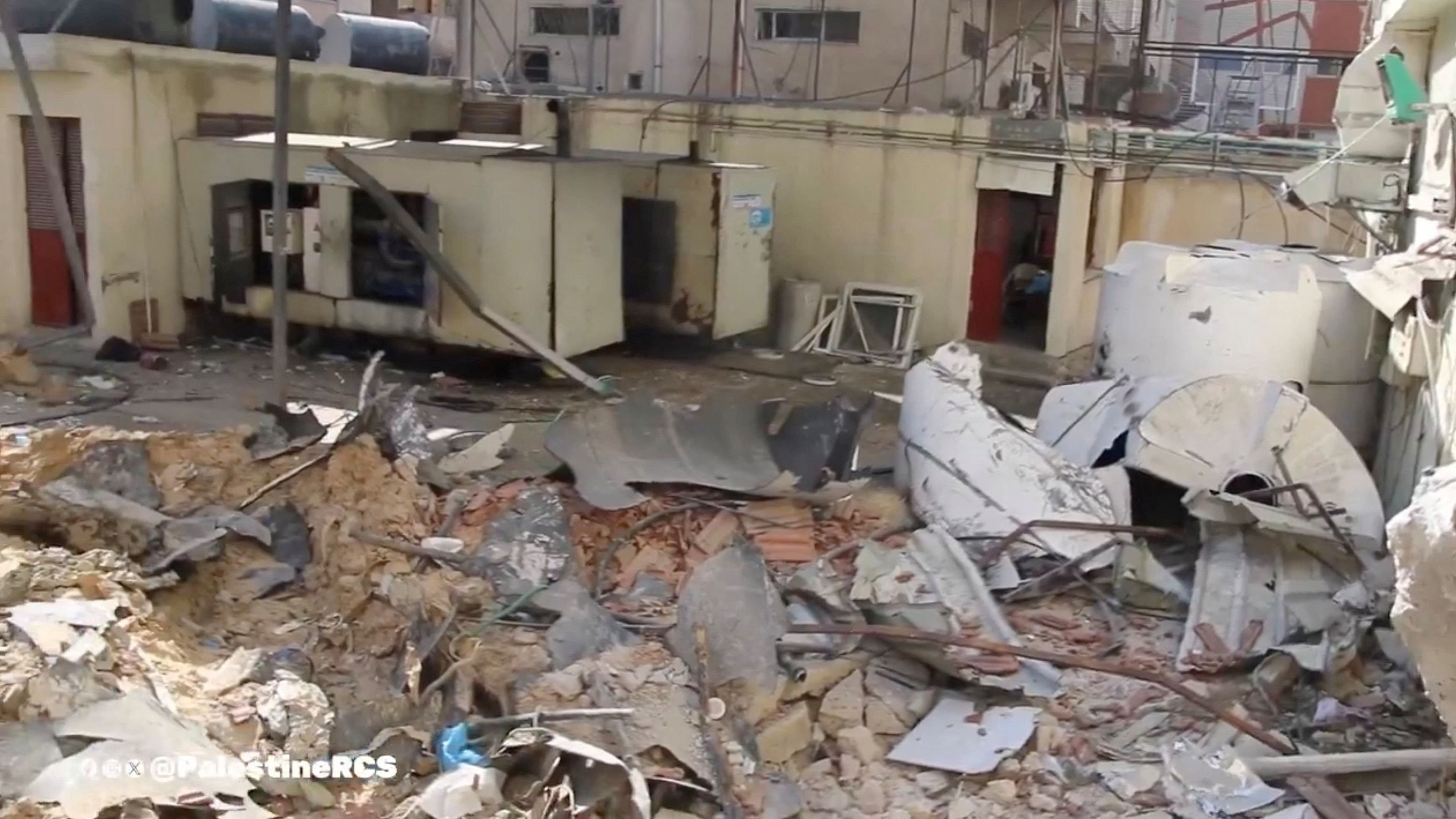 <div class="paragraphs"><p>Destroyed buildings and rubble are seen around the damaged PRCS Al-Amal Hospital, amid the ongoing conflict between Israel and Palestinian Islamist group Hamas, in Khan Younis, Gaza.</p></div>