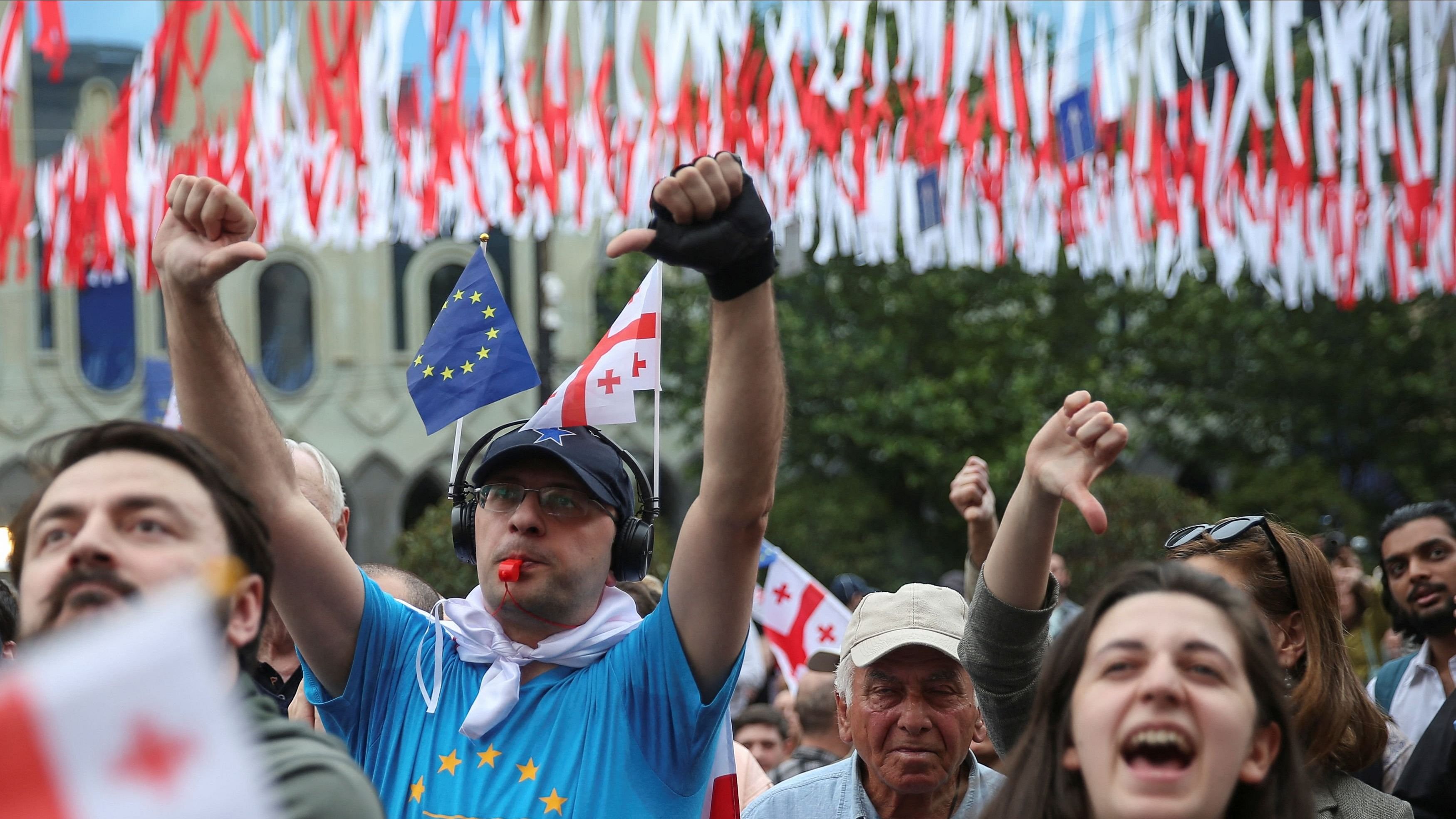 <div class="paragraphs"><p>Demonstrators hold a rally to protest against a bill on "foreign agents", after Georgia's parliament voted to override a presidential veto of the bill, in Tbilisi, Georgia, May 28, 2024. </p></div>