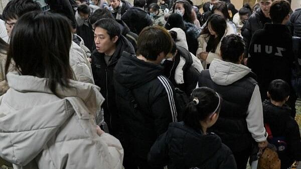 <div class="paragraphs"><p>People are seen at a subway station in Beijing on January 17, 2024.</p></div>