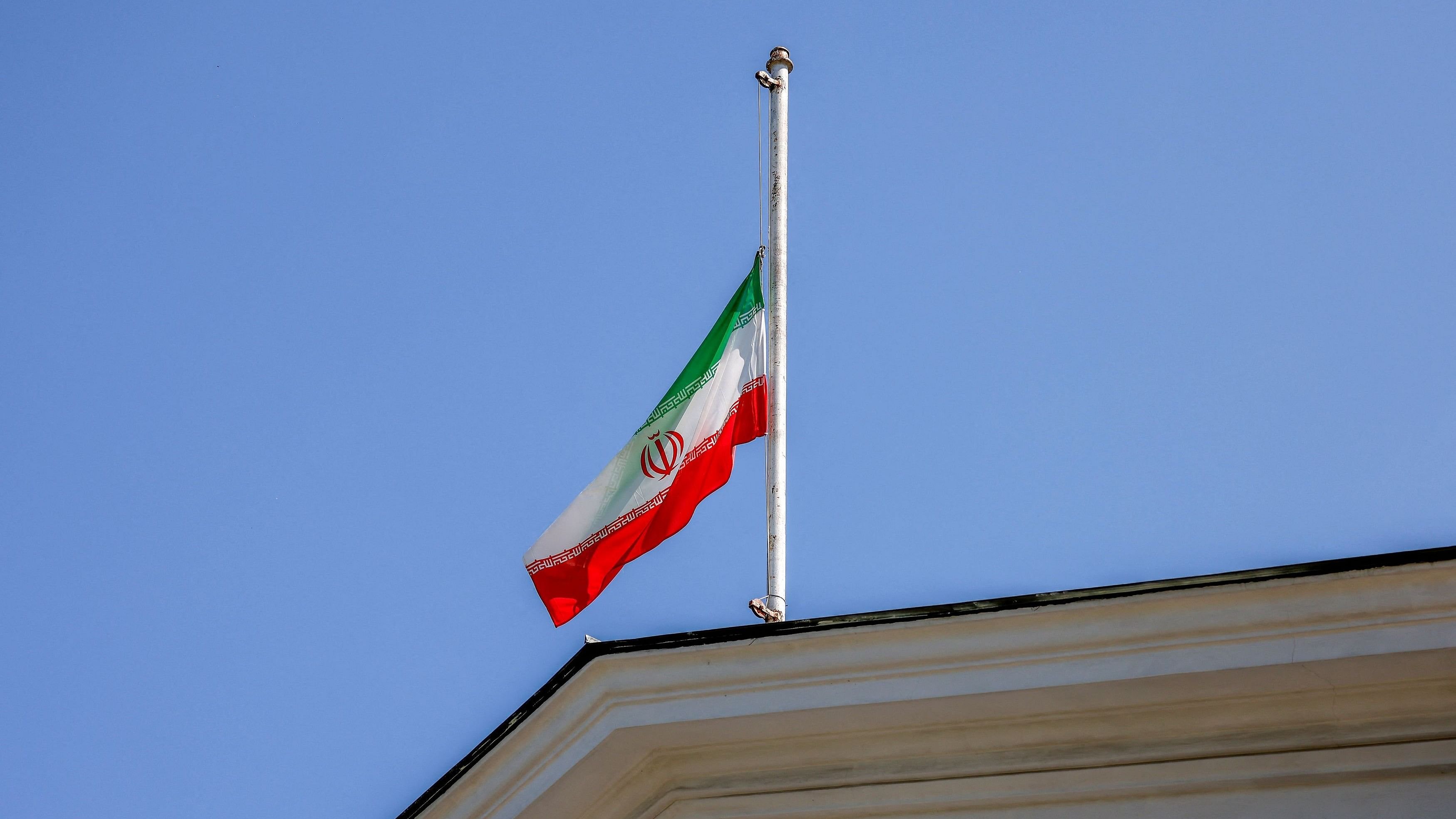 <div class="paragraphs"><p>A flag flies at half-mast at the Iranian embassy.</p></div>