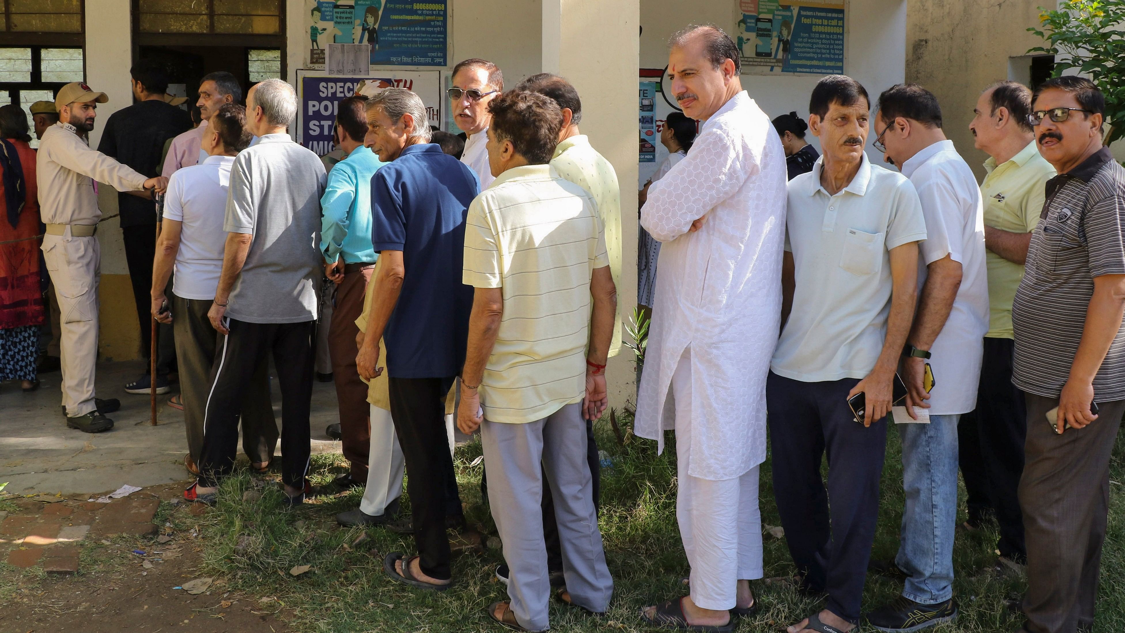 <div class="paragraphs"><p>Kashmiri Pandits stand in a queue as they attempt to cast their vote during the fourth phase of Lok Sabha elections, at Roopnagar in Jammu district, Monday, May 13, 2024.</p></div>