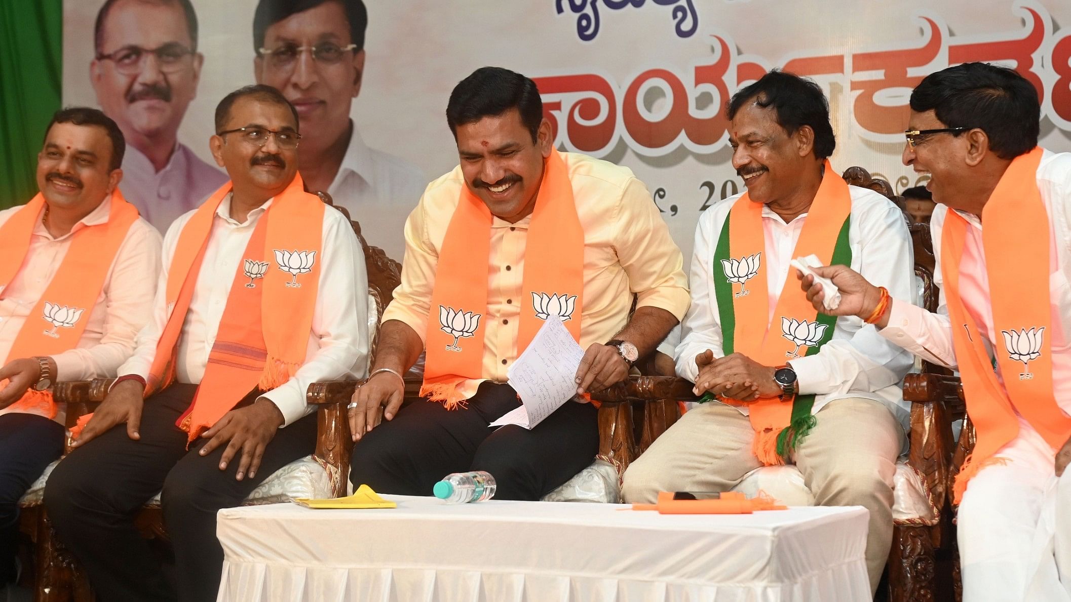 <div class="paragraphs"><p>BJP state president B Y Vijayendra share a lighter moment with candidates Bhoje Gowda, Dr Dhananjay Sarji and BK BJP President Sathish Kumpala during party workers meeting held as a preparation for teachers and graduates constituencies election in Mangaluru on Monday. </p></div>