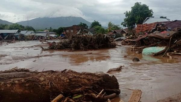 <div class="paragraphs"><p>File photo of flash floods in Indonesia.</p></div>