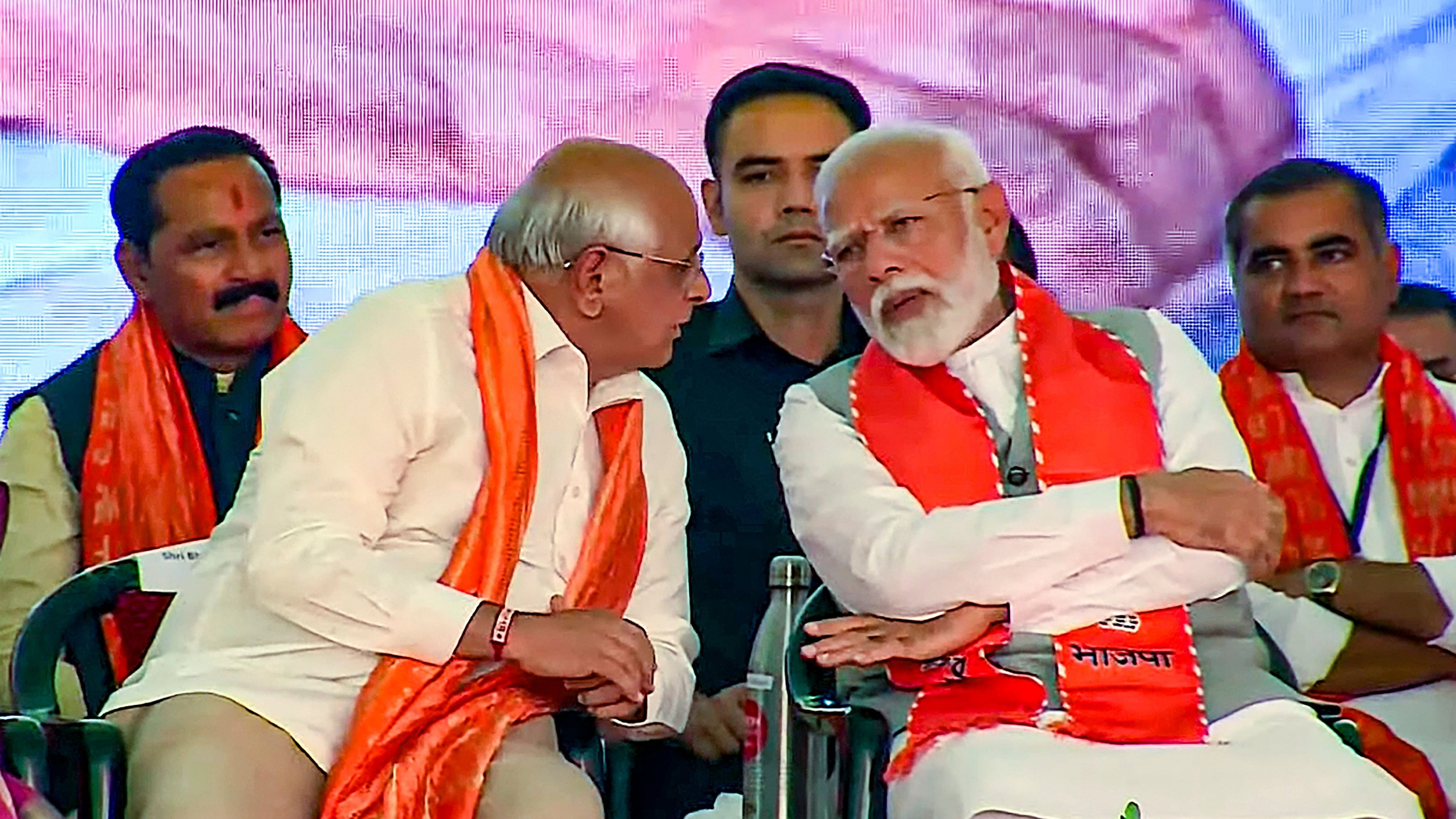<div class="paragraphs"><p>Prime Minister Narendra Modi with Gujarat Chief Minister Bhupendra Patel during a public meeting, ahead of the third phase of Lok Sabha elections, in Surendranagar district, Thursday, May 2, 2024. </p></div>