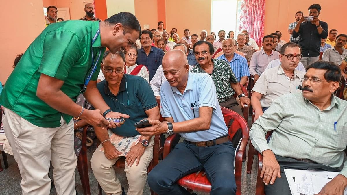 <div class="paragraphs"><p>Lohith C, Assistant Sub-Inspector, CEN Crime North Division, interacts with senior citizens during a programme in the city on Friday. </p></div>